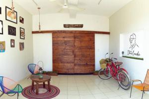 a room with two bikes and a wooden door at Casa don Conde/equipado/wifi/bicicletas gratis. in Valladolid