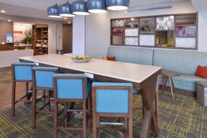 a conference room with a table and chairs at Hampton Inn Lakeville Minneapolis, Mn in Lakeville