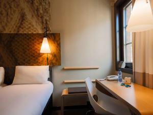 Postel nebo postele na pokoji v ubytování ibis Hotel Brussels off Grand'Place