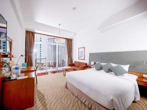 Postel nebo postele na pokoji v ubytování Novotel Nha Trang