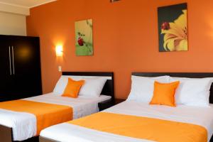 Postel nebo postele na pokoji v ubytování Hotel PLATINIUM