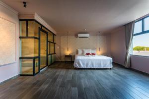 Voodi või voodid majutusasutuse Hotel MID Project toas