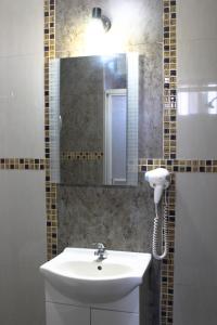 Koupelna v ubytování Hotel PLATINIUM