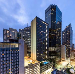a view of a city skyline with tall buildings at Hilton Garden Inn Downtown Dallas in Dallas