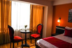 Postel nebo postele na pokoji v ubytování Hotel PLATINIUM
