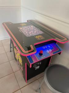 a ping pong table in a room at Small Town, Big House - Sleeps 8! in Taylor