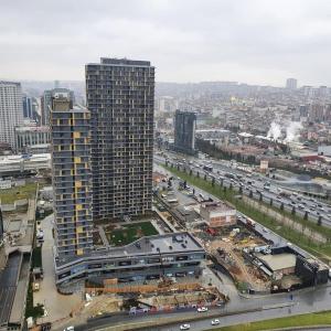 uma vista superior de uma cidade com um edifício alto em TOYA Next Residence em Istambul
