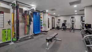 a fitness room with a gym with several equipment at The Hub Murray Hill, BW Premier Collection in New Providence