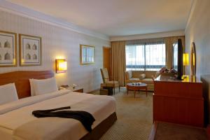 Voodi või voodid majutusasutuse Radisson Blu Martinez Beirut toas
