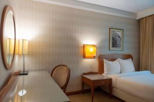 Voodi või voodid majutusasutuse Radisson Blu Martinez Beirut toas