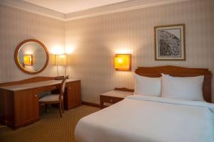Voodi või voodid majutusasutuse Radisson Blu Martinez Beirut toas