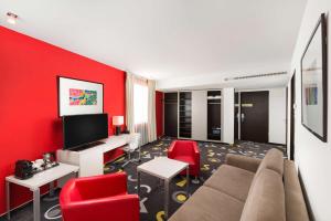 Televízia a/alebo spoločenská miestnosť v ubytovaní Park Inn by Radisson Sarvar Resort & Spa - All Inclusive