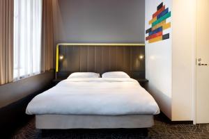a pair of beds in a hotel room at Park Inn by Radisson Central Tallinn in Tallinn