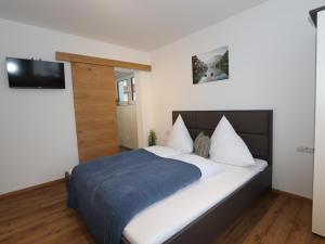 Postel nebo postele na pokoji v ubytování Apartment Recher