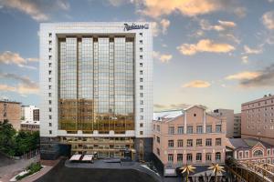a rendering of a tall building in a city at Radisson Blu Belorusskaya in Moscow