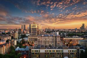 a view of a city skyline at sunset at Radisson Blu Belorusskaya in Moscow