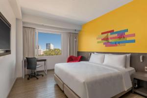Postel nebo postele na pokoji v ubytování Park Inn By Radisson Iloilo