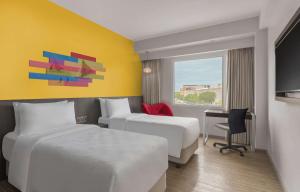Postel nebo postele na pokoji v ubytování Park Inn By Radisson Iloilo