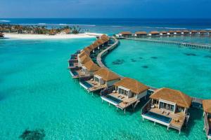 an aerial view of a resort in the ocean at Radisson Blu Resort Maldives in Fenfushi