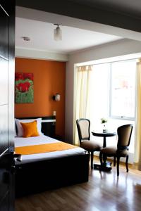 Postel nebo postele na pokoji v ubytování Hotel PLATINIUM