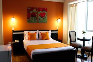 Postel nebo postele na pokoji v ubytování Hotel PLATINIUM