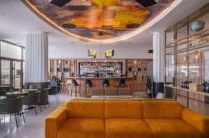 Zona de lounge sau bar la Radisson Blu Grand Hotel & Spa, Malo-Les-Bains