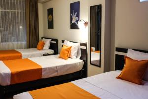 Postel nebo postele na pokoji v ubytování Hotel PLATINIUM + 37 fotografií