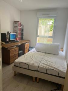 Postel nebo postele na pokoji v ubytování L’Alsace autrement