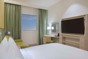Sjónvarps- og/eða afþreyingartæki á Hampton By Hilton Doha Old Town