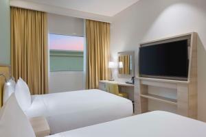 Sjónvarps- og/eða afþreyingartæki á Hampton By Hilton Doha Old Town