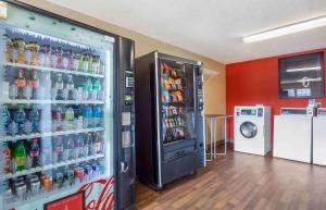 a soda vending machine filled with lots of drinks at Extended Stay America Suites - Charleston - North Charleston in Charleston