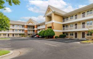 a large apartment building with a parking lot at Extended Stay America Suites - Chattanooga - Airport in Chattanooga
