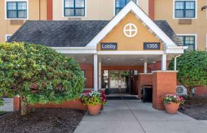 a lobby of a building with a sign on it at Extended Stay America Suites - Merrillville - US Rte 30 in Merrillville