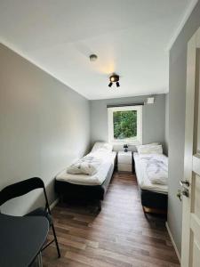 A bed or beds in a room at Prestadalen 6