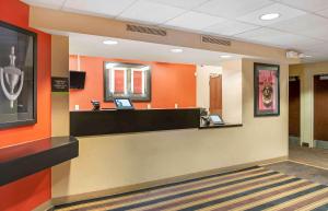a lobby of a hospital with a reception desk at Extended Stay America Select Suites - Detroit - Farmington Hills in Farmington Hills