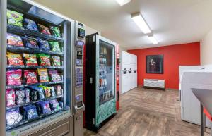 a large refrigerator in a room with food inside at Extended Stay America Suites - Phoenix - Peoria in Peoria