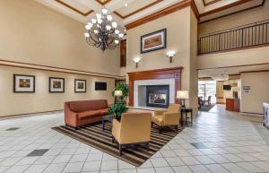 a lobby of a hotel with a fireplace at Extended Stay America Suites - Dallas - Frankford Road in Plano