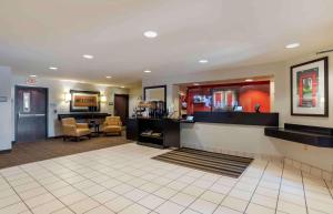 a lobby of a hotel with a waiting room at Extended Stay America Suites - New Orleans - Metairie in Metairie