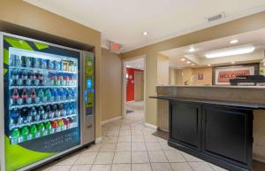 a large soda vending machine in a store at Extended Stay America Suites - Chicago - Schaumburg - Convention Center in Schaumburg