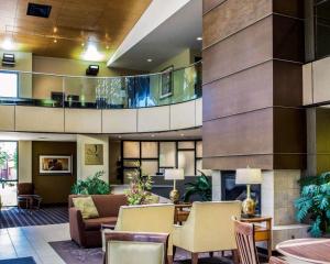 a lobby of a hotel with couches and chairs at Quality Inn & Suites in Peoria