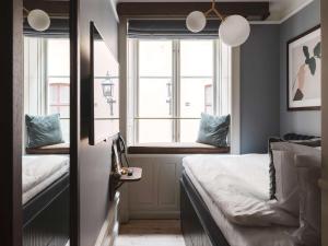 Rúm í herbergi á Hotel Frantz, WorldHotels Crafted