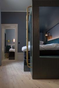 Rúm í herbergi á Hotel Frantz, WorldHotels Crafted