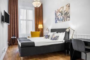 Voodi või voodid majutusasutuse Hotell Linnéa - Helsingborg toas