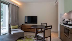 TV a/nebo společenská místnost v ubytování Radisson Blu Hotel & Residence Nairobi Arboretum