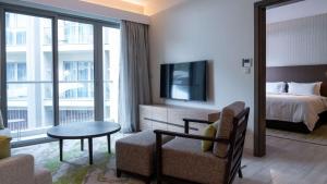 TV a/nebo společenská místnost v ubytování Radisson Blu Hotel & Residence Nairobi Arboretum