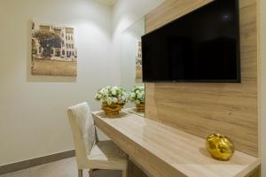 تلفاز و/أو أجهزة ترفيهية في Palm Boutique Al Zahra بالم بوتيك الزهراء