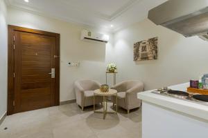 مطبخ أو مطبخ صغير في Palm Boutique Al Zahra بالم بوتيك الزهراء