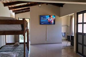 Televízia a/alebo spoločenská miestnosť v ubytovaní Casona Huascaran