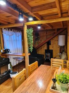 Posezení v ubytování Cabaña en Los Reartes