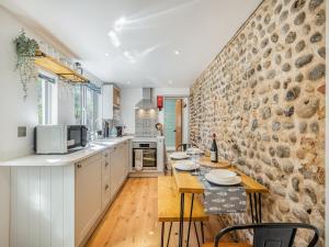 Köök või kööginurk majutusasutuses Cromer Cottage